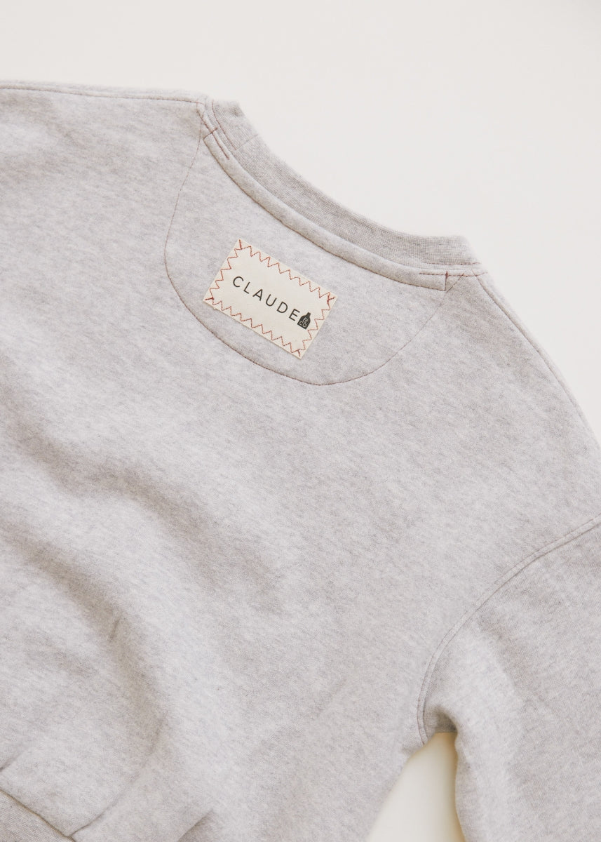 carner milking it grey sweater