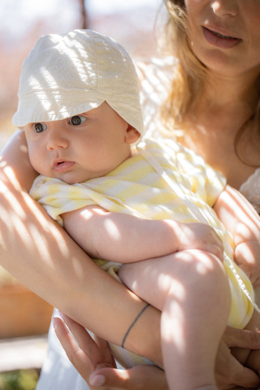 terry onesie romulo - pastel-yellow