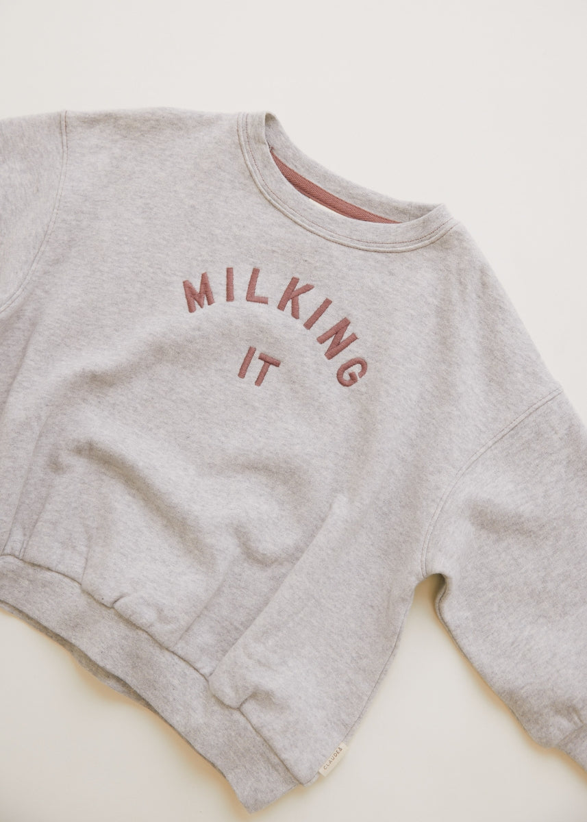carner milking it grey sweater
